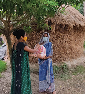 Social workers delivering supplies in North 24 Parganas, part of Tagore Beyond Boundaries’ efforts to support health in Kolkata’s suburbs.