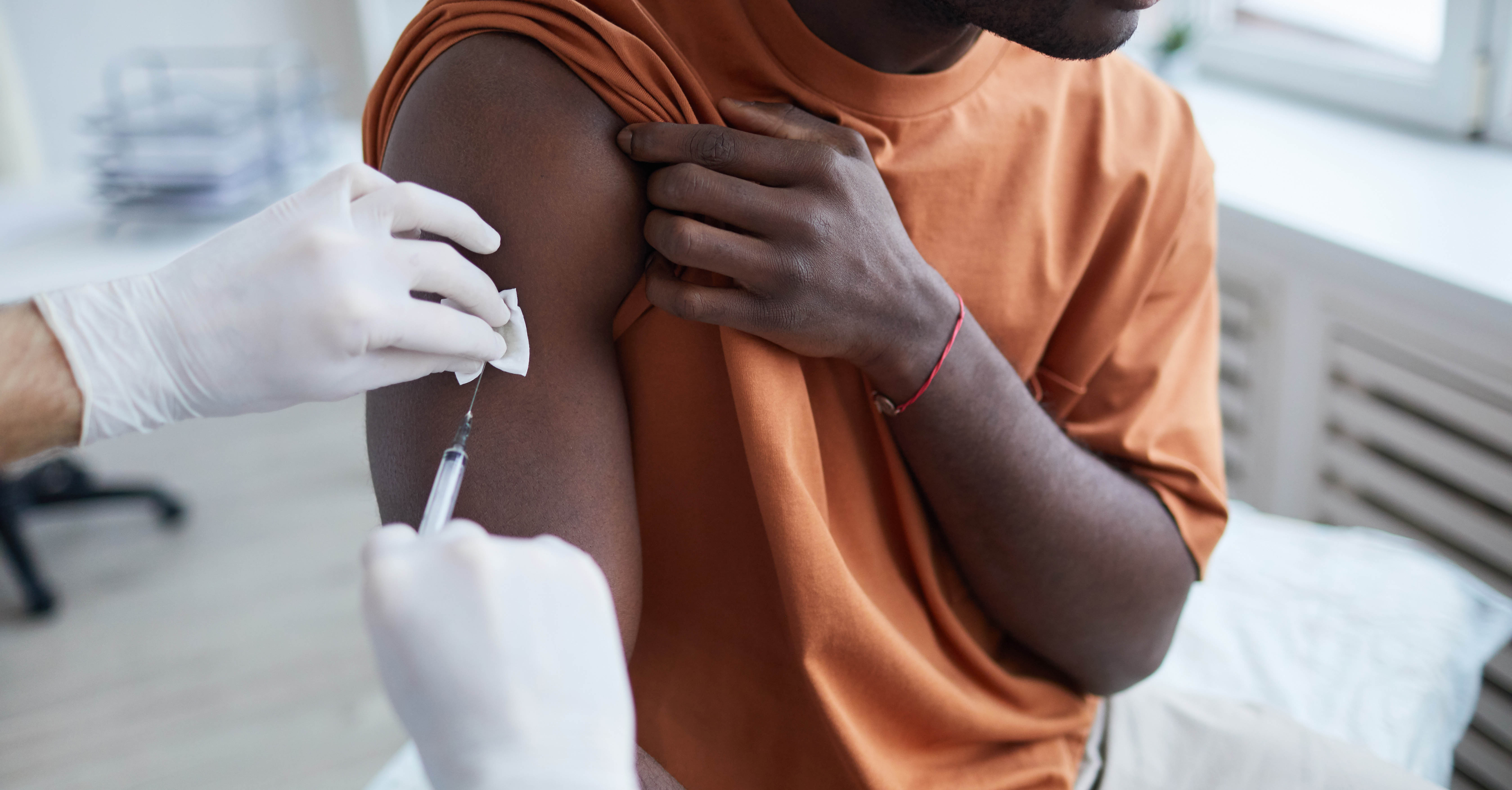 man receiving vaccine