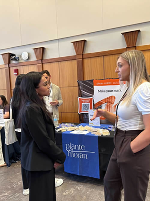 Students and staff interacting at the Michigan Public Health Career Fair