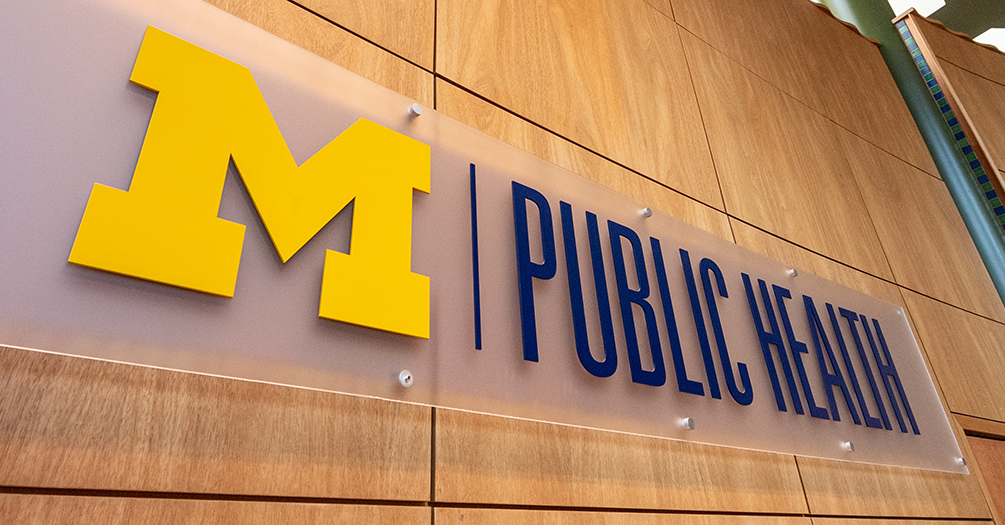Public health sign with wood panel, University of Michigan School of Public Health
