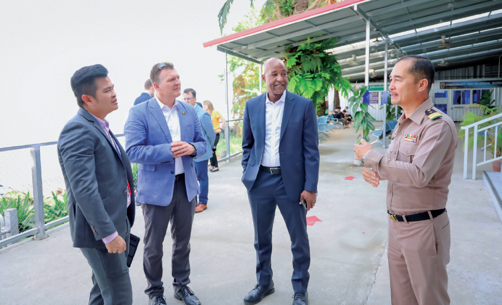 Kowit Nambunmee, associate professor at Mae Fah Luang University (far left), with Neitzel, Bowman and Somboon Supa-in, director of the Chiang Saen District Health Office (far right).