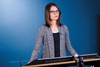 Dr. Belinda Needham delivers a lecture in the school’s multimedia instructional studio.