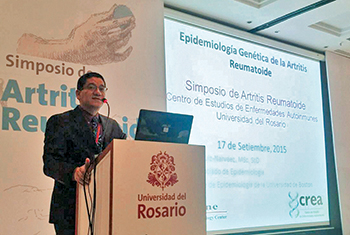 Edward Ruiz-Narváez presenting in Bogota, Colombia, at a rheumatoid arthritis symposium.
