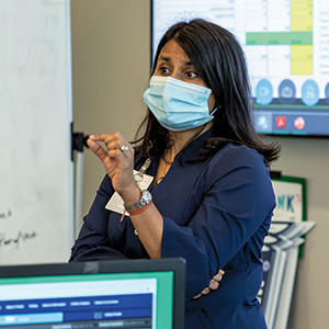 Gupta presenting to group 