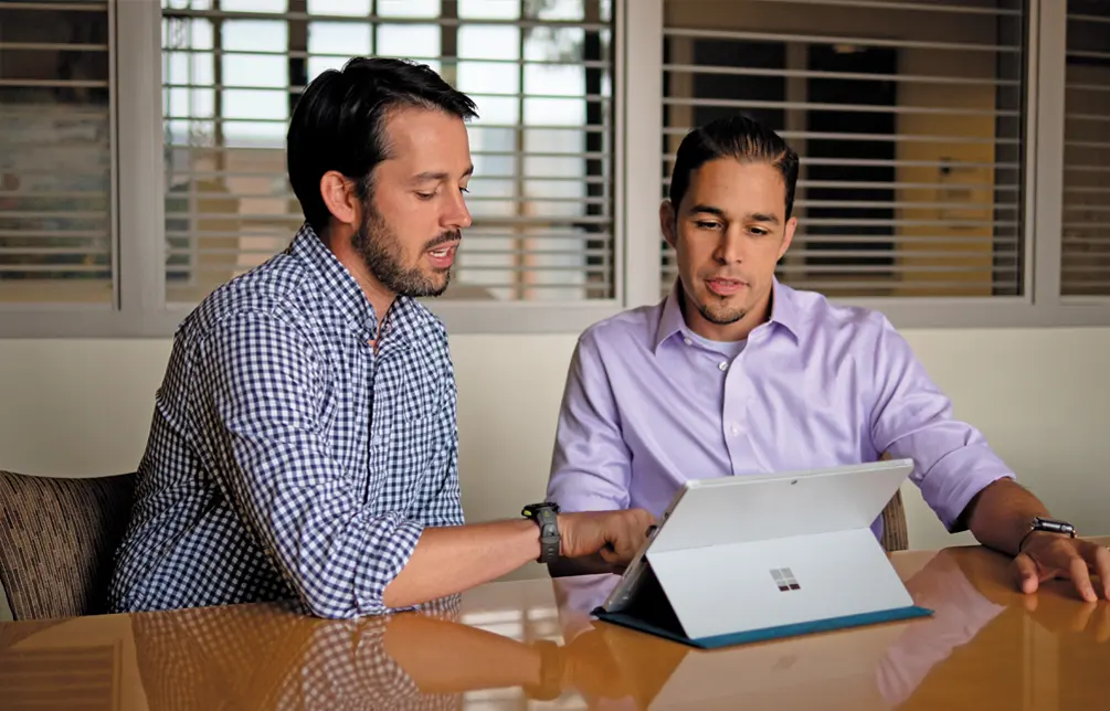 Fleming and Lopez reviewing data in 2018