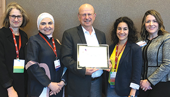 Frank Ascione receives the Interprofessional Educator and Mentor of the year at the international Collaborating across Borders conference in October 2019