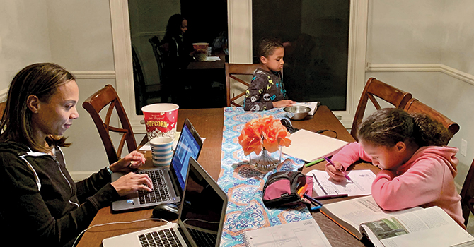 Tori Melendez, master’s student in Health Management and Policy, enjoying family study time at home.