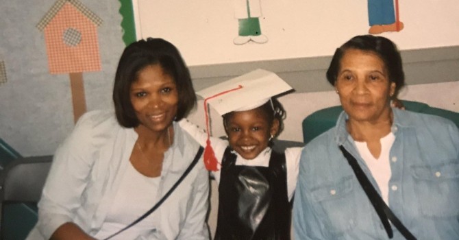 Dania, her mother, and grandmother at Dania's preschool graduation, 2002