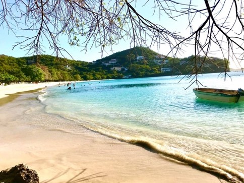 Small boat along the beach coast