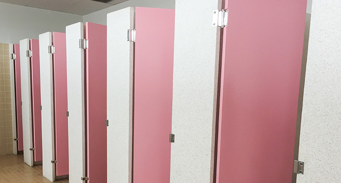 pink bathroom stalls