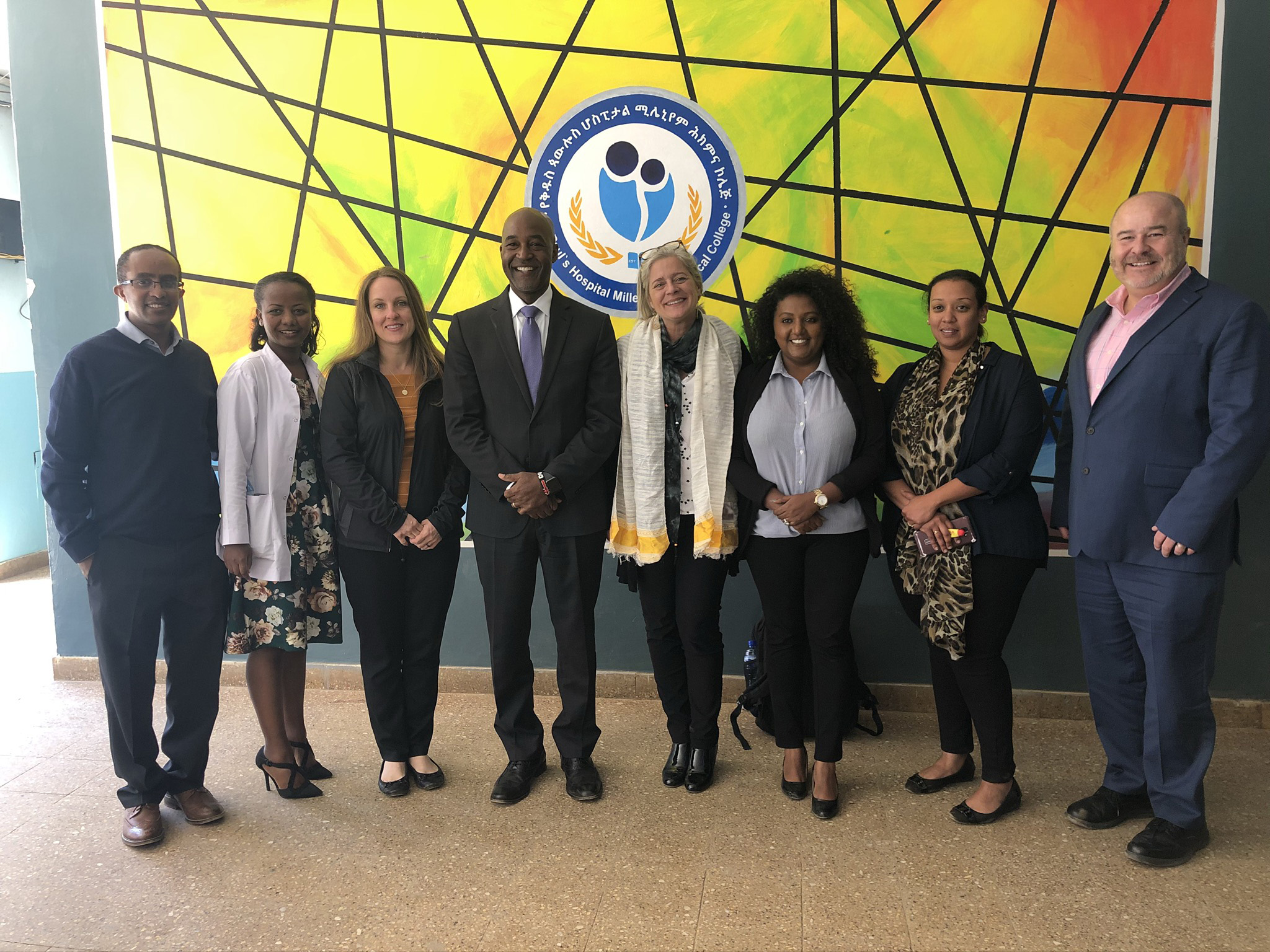 Michigan Public Health’s Berhanu Gebremeskal, DuBois Bowman, Rivet Amico, Amy Sarigiannis and Gary Harper pose for a photo with members from St. Paul’s Hospital Millennium Medical College