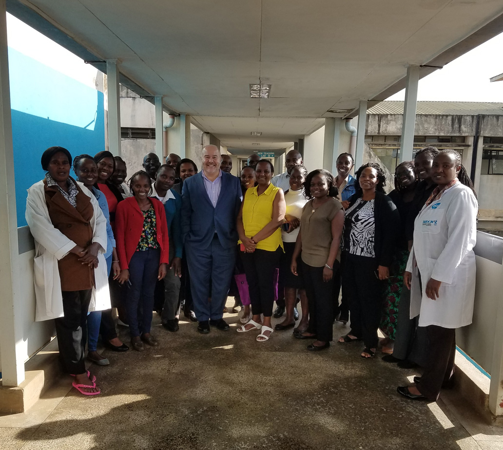 Gary Harper poses with workshop participants from the University of Nairobi.