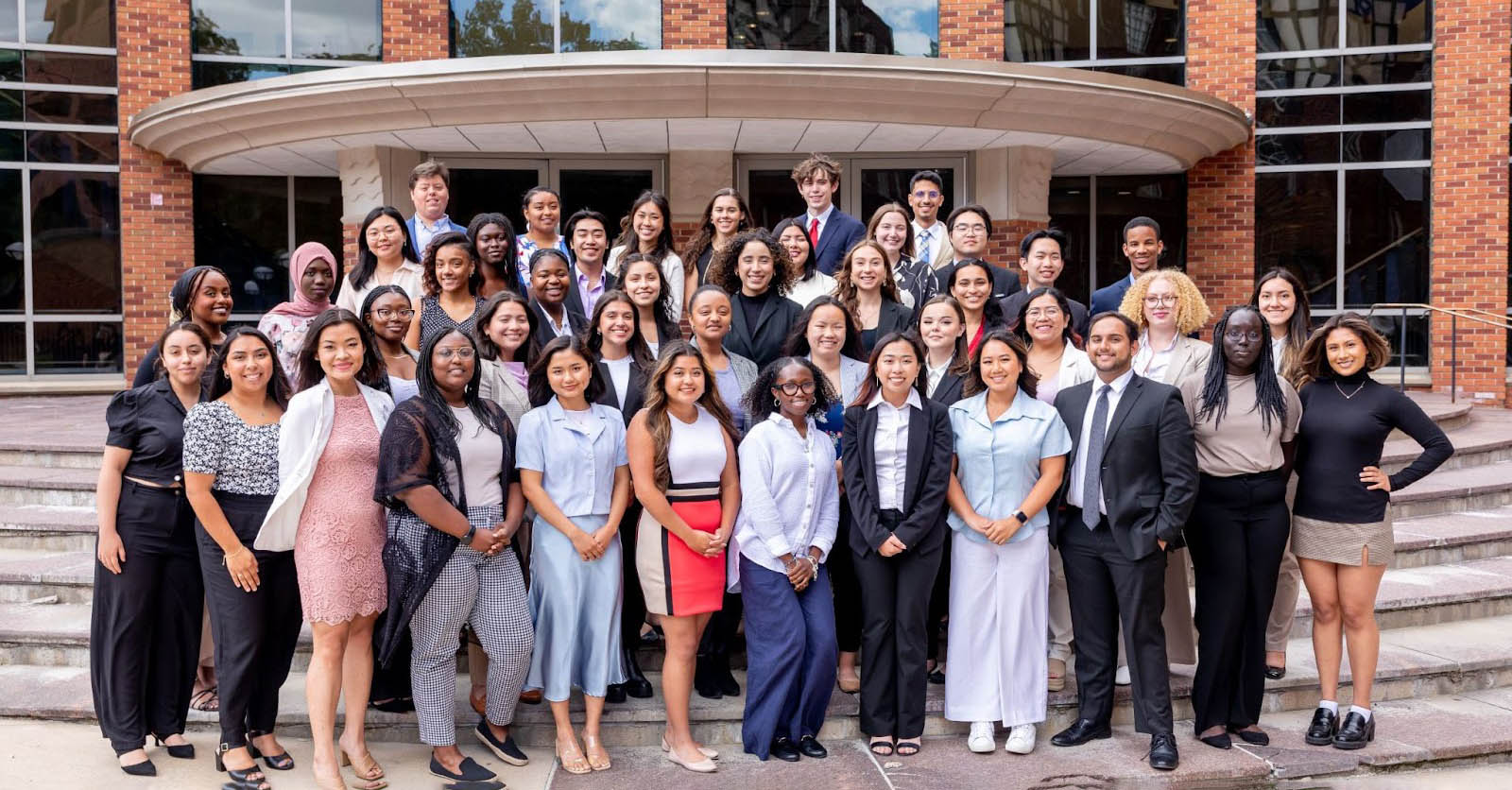 Future Public Health Leadership Program members stand outside of the University of Michigan School of Public Health.