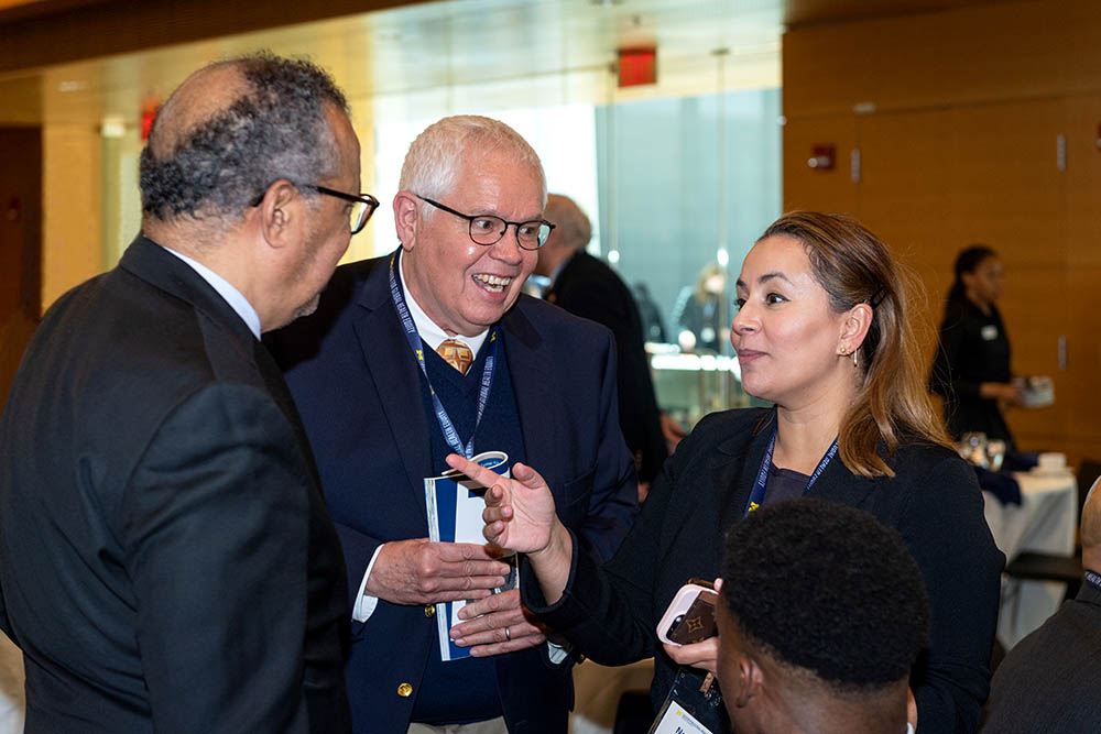 Matthew Boulton with Dr. Tedros Adhanom Ghebreyesus, director-general of the World Health Organization, and Natasha Bagdasarian, chief medical executive for the state of Michigan, at a March 2023 celebration of the global health equity movement at the University of Michigan.