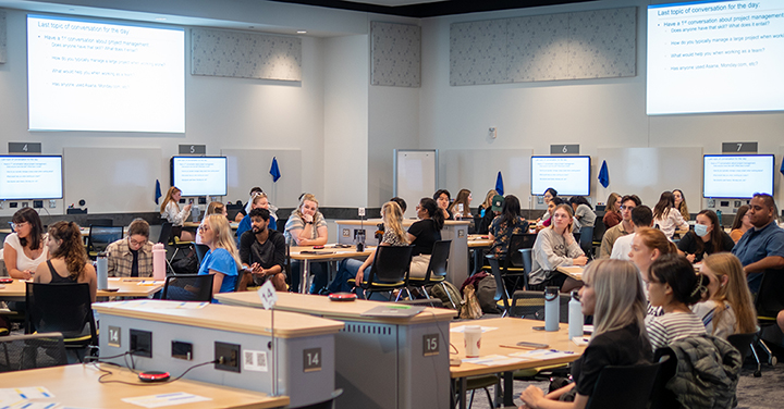 A team-based classroom in the Central Campus Classroom Building with technology at each group table