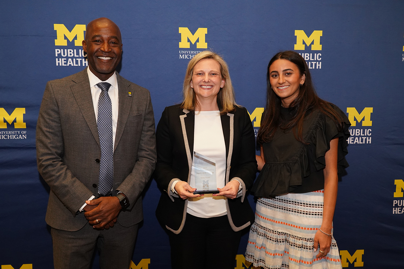 From left to right, Michigan Public Health Dean F. DuBois Bowman, Emily Youatt and Reem Fawaz