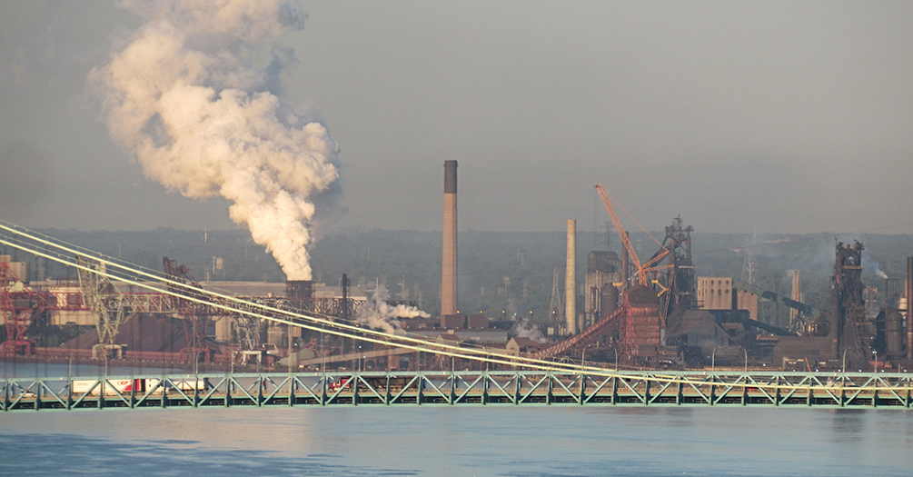 A factory releasing pollutants in the Detroit