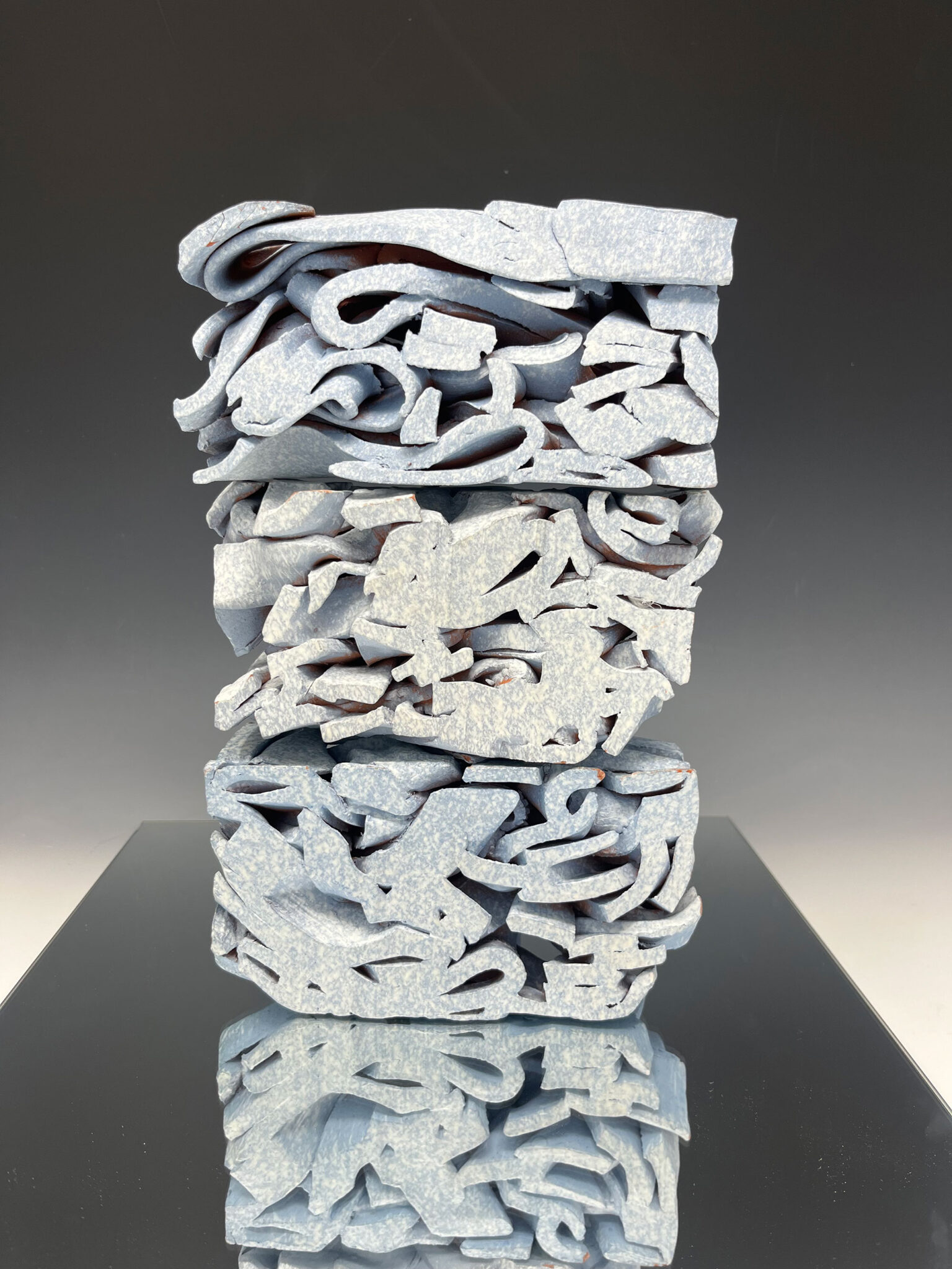 Irina Bondarenko created this work called “Reflection,” the result of discarded pieces of cylinders. (Photo by Irina Bondarenko)