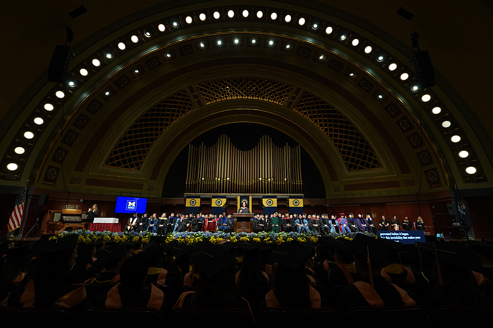 Kristen J. Sarri addresses the audience fromthe point of view from deep in the crowd at at Hill Auditorium