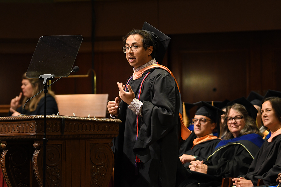 Student speaker Irving Suarez addresses the audience.