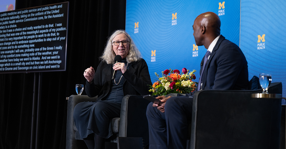 Dr. Rachel Levine, left, talks with Dean F. DuBois Bowman, while both are seated at The Exchange event