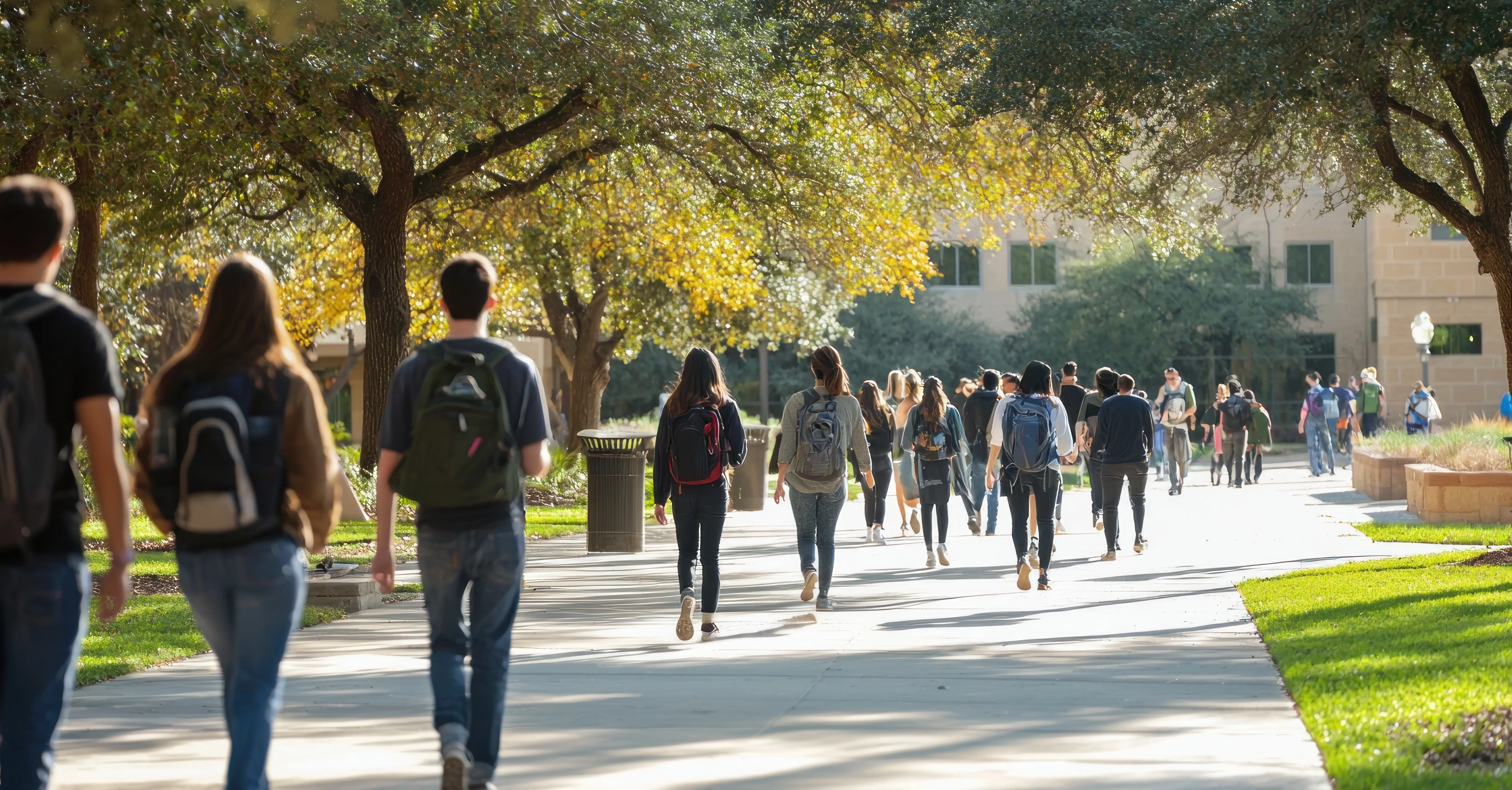 Students walking across a college campus