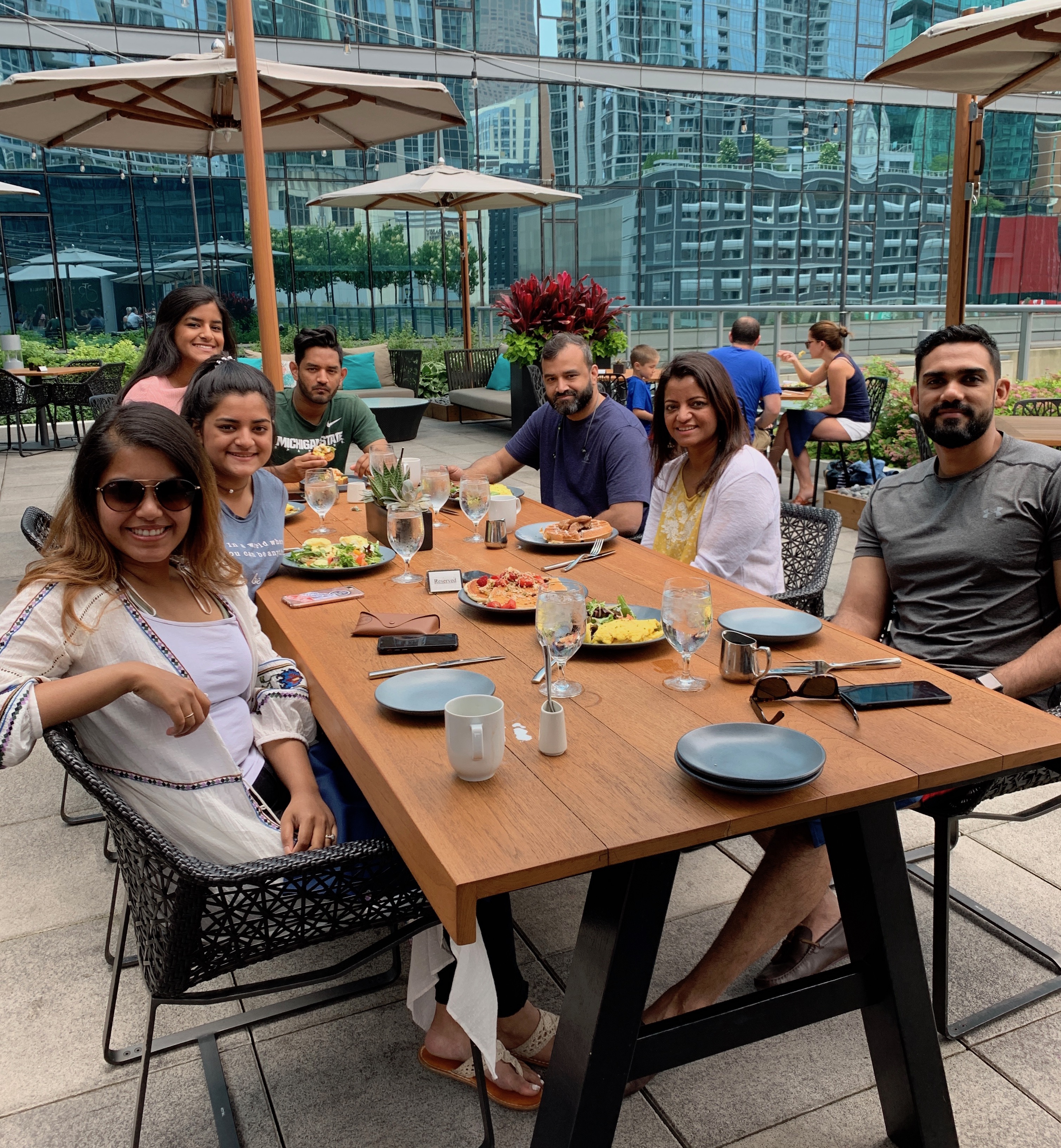 The author breaking bread with friends and family