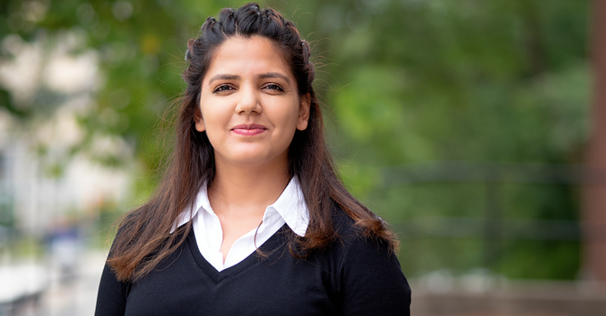 Master's Student Kashvi Gupta standing outside the University of Michigan School of Public Health