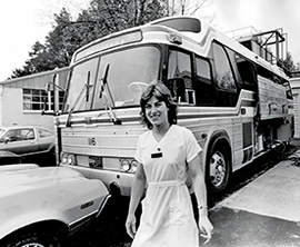 Randel Richner in front of the dialysis bus