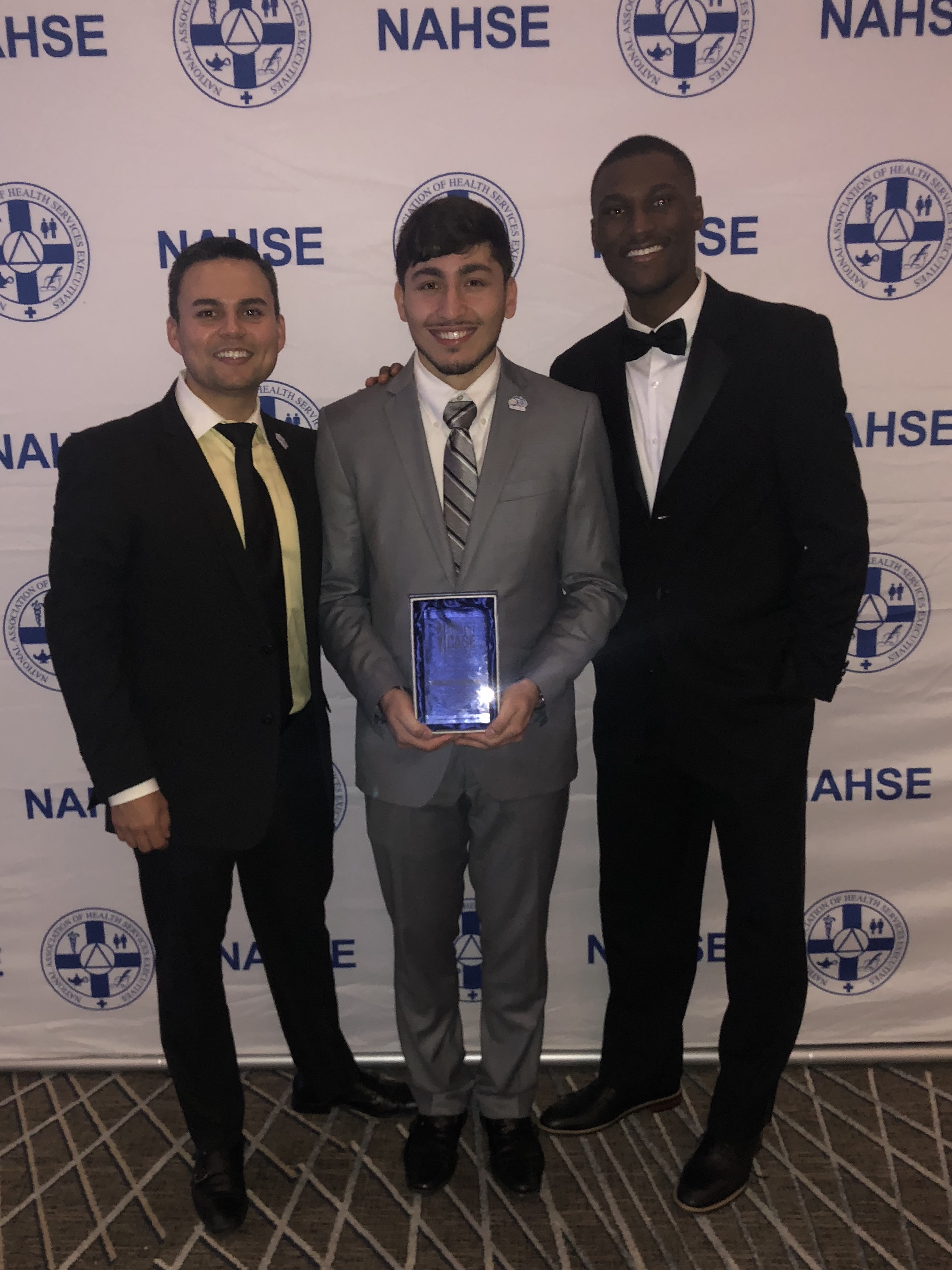 Gutierrez with fellow Health Management and Policy students Zechariah Attar and Philip Cooper at the National Association of Healthcare Executives Case Competition