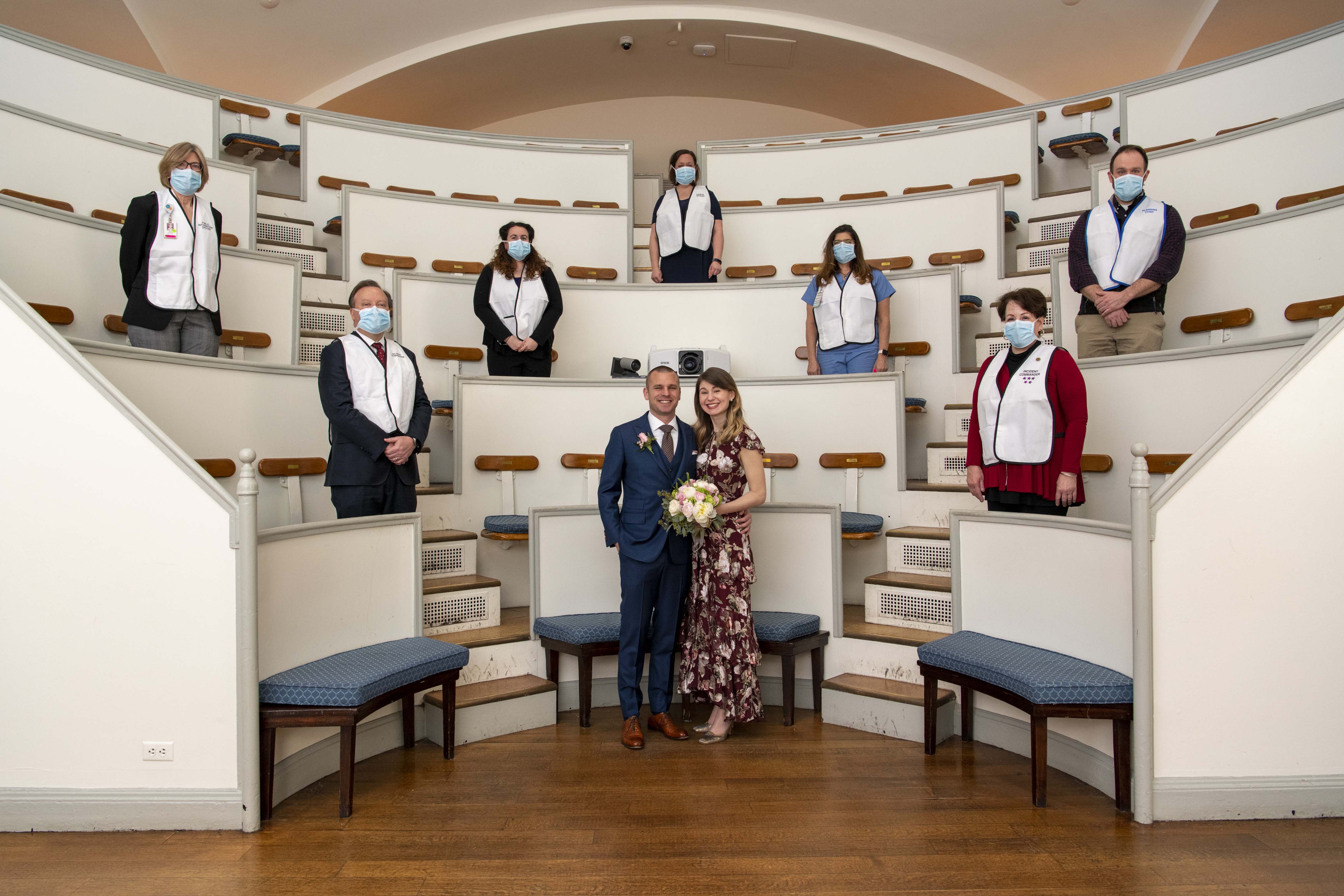 Jen and Matt at their wedding ceremony with their guests