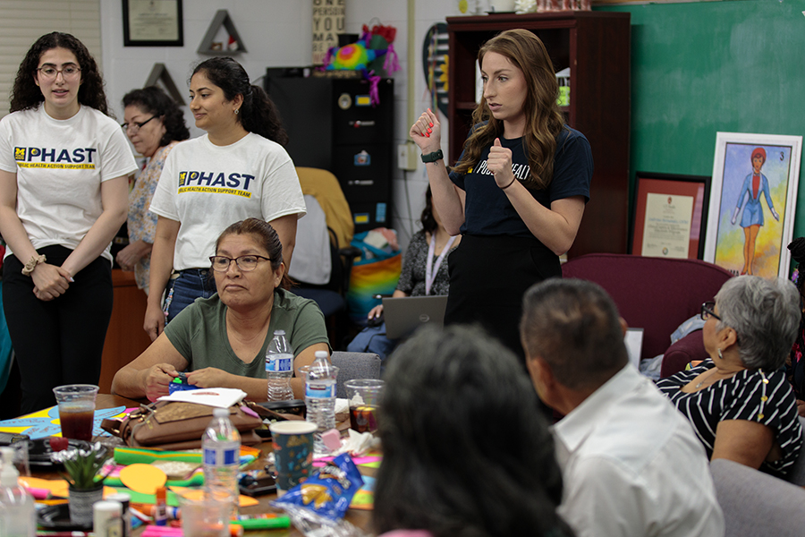 Lauren Czarnowczan, right, student programs specialist for PHAST, led a group of 13 students to San Antonio in May 2024 for a weeklong community engagament with its community members.